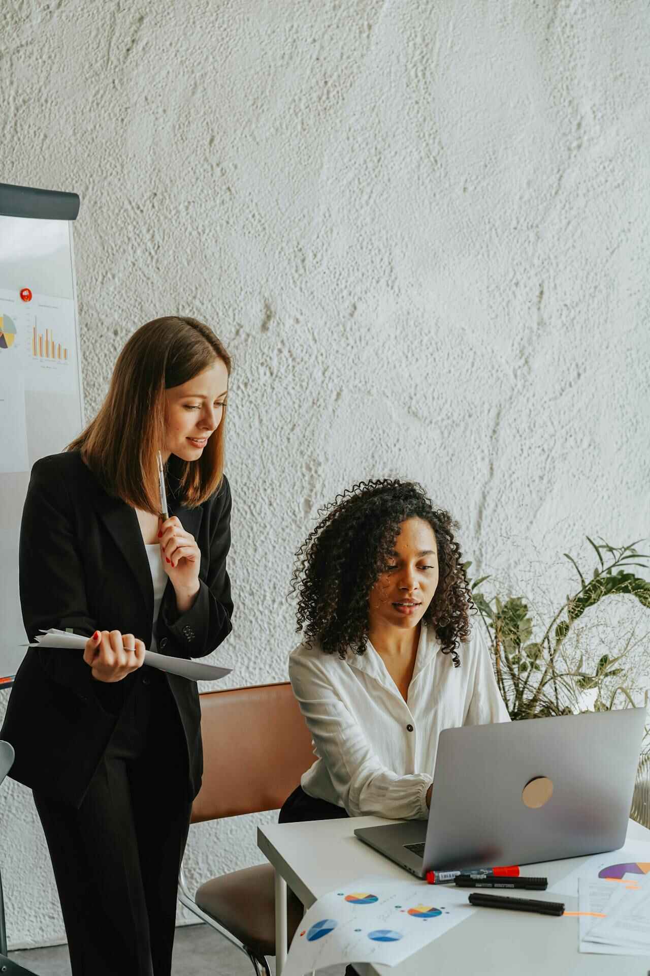 two coworkers discussing a project